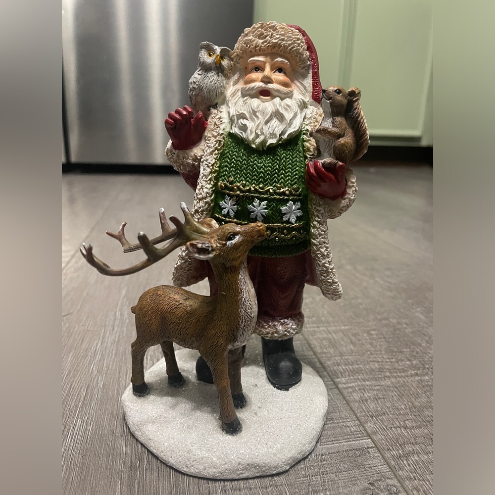 Santa and his woodland friends statue